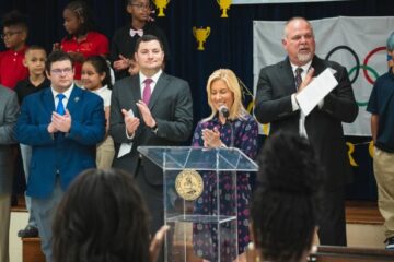 Mayor Donna Deegan addresses the audience at the Show Up and Shine press conference.