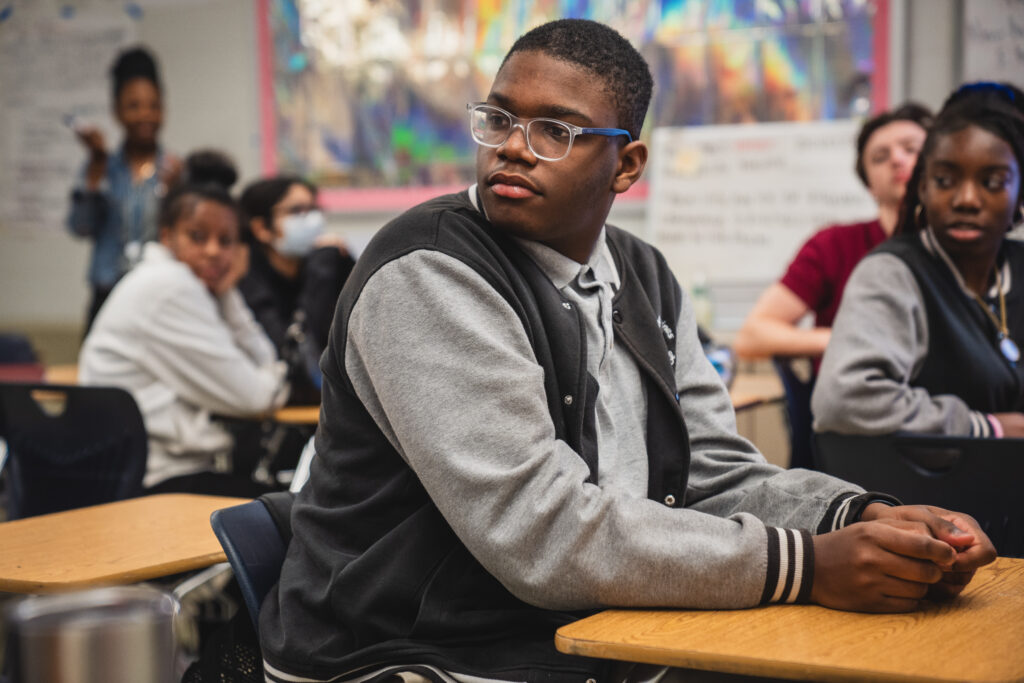 School attendance - Raines High School students sitting in their desks as their teacher gives a lesson